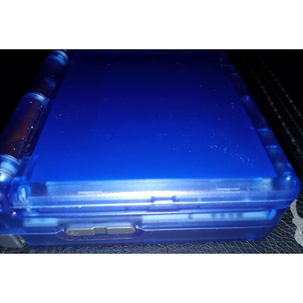 Anbernic Rg35xxsp transparent blue handheld